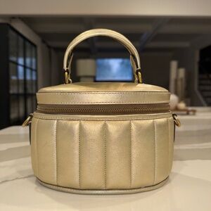 Coach gold quilt bag